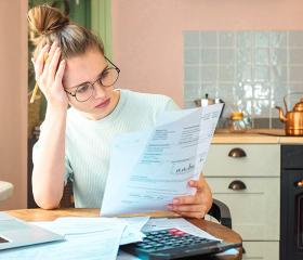 Woman looking at credit report