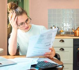 Woman looking at credit report